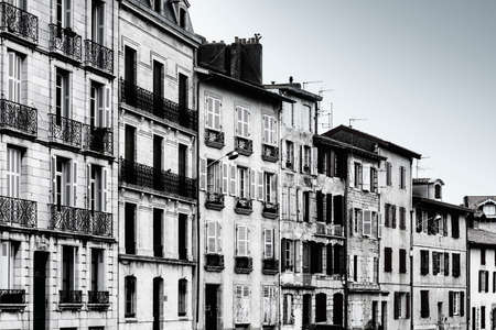 Classic european architecture in France. French windows with light balcony in Biarritzの写真素材