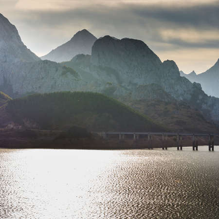 Beautiful landscape in Spain. Dramatic view of Cantabrian Mountains with artificial lakeの写真素材