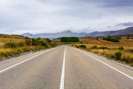 Winding asphalt road of Europe Peaks in Spain early morning