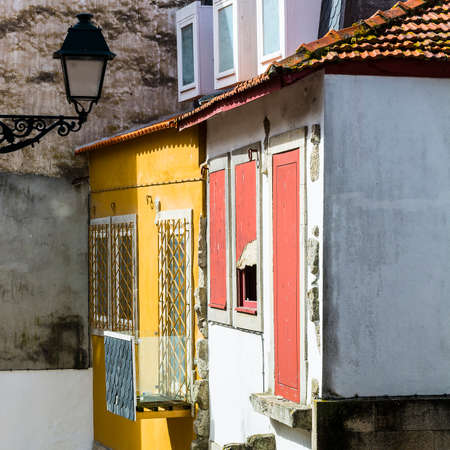 View of the historical centre of the city of Porto with traditional Portuguese facades sometimes...