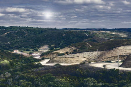 Portuguese Atlantic Ocean beach in the light of the moon. Breathtaking landscape and nature of the Portugal, popular travel destination in western Europe. の写真素材