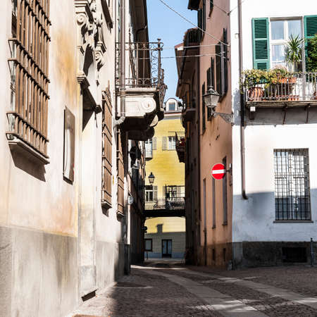 Architecture of the Medieval Piedmont City of Cuneo in Italy. Vintage Italian lamps and balconies in Mediterranean styleの写真素材