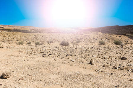 Rocky hills of the Negev Desert in Israel at sunrise. Breathtaking landscape of the desert rock formations in the Southern Israel Desert.の写真素材