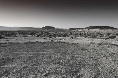 Dramatic scene in black and white of the rocky hills of the Negev Desert in Israel. Breathtaking...