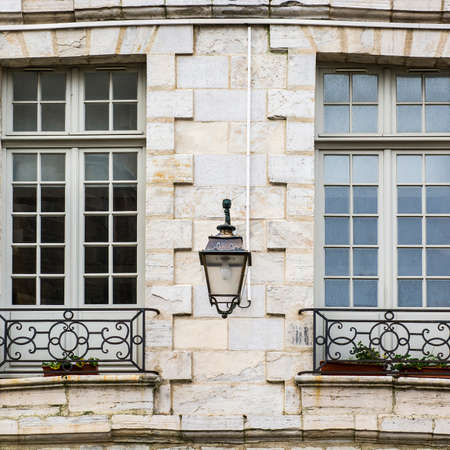 Classic european architecture in France. French windows with light balcony in Biarritzの写真素材