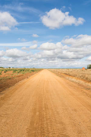 Autumn fields in Spain before harvesting. Service dirt road for agricultural productionの写真素材