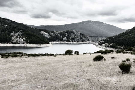 Beautiful landscape in Spain. Dramatic view of Cantabrian Mountains with artificial lake