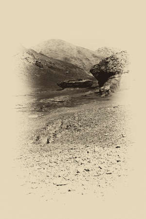 Loneliness and emptiness of the rocky hills of the Negev Desert in Israel. Breathtaking landscape and nature of the Middle East. Black and white photoの写真素材