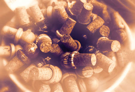 Wine corks as a symbol of excessive alcoholism during quarantine in a contemporary style.