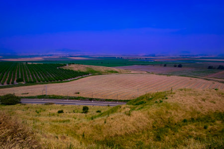 View of the Israeli Golan Heights with vineyards and developed agriculture, Druze cities and paved...