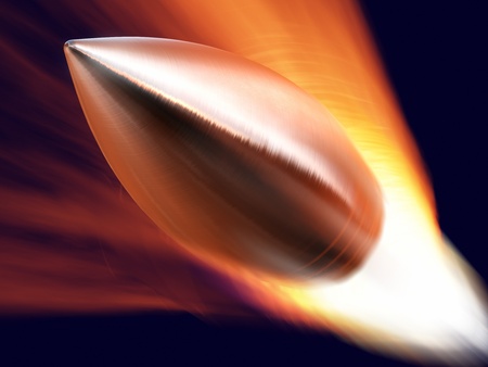 Flying bullet with fire trailの写真素材