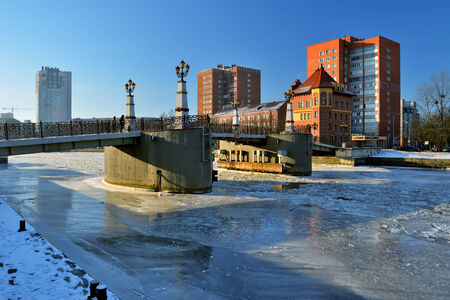 KALININGRAD, RUSSIA - JANUARY 24: Pedestrian bridge, embankment of the Fishing Village on January 24, 2014 in Kaliningrad, Russia. のeditorial素材