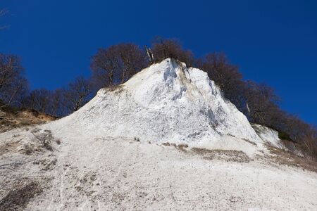 SASSNITZ, GERMANY - APRIL 3, 2015: High chalk cliffs at the coast of Rugen island, Jasmund National Park, Mecklenburg-Vorpommern, Germanyのeditorial素材