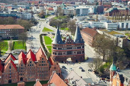 LUBECK, GERMANY - APRIL 5, 2015: Holstentor Gate in Lubeck old town, is the second largest city in Schleswig-Holstein, northern Germany.のeditorial素材