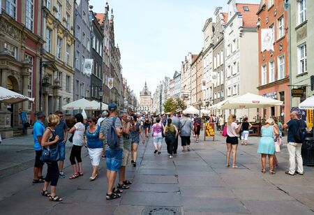 GDANSK, POLAND - AUGUST 12, 2015: People walking on streets in historical center of Gdanskのeditorial素材