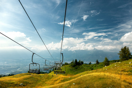 Mountain chairlift in Nevegal, Belluno, Italy.の写真素材