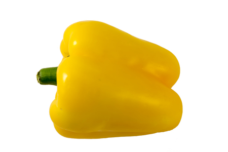 Yellow pepper with green tail on a white background.の写真素材