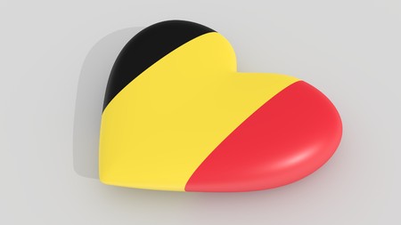 Heart in the colors of Belgium flag, on a white, 3d renderingの写真素材