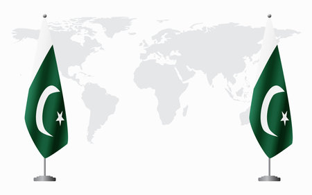 Pakistan and Pakistan flags for official meeting against background of world map.のイラスト素材