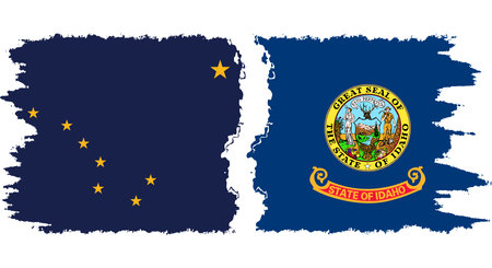 Idaho and Alaska states grunge brush flags connection, vectorのイラスト素材