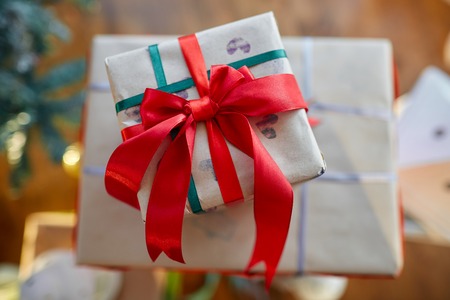 Santa Claus gives presents at the celebration Christmasの写真素材