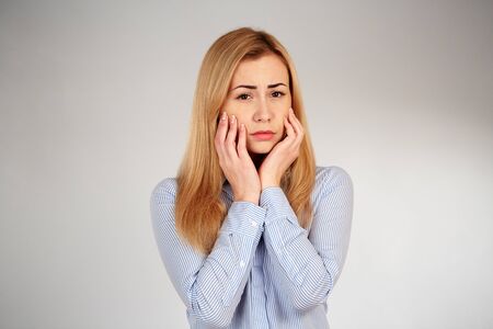 Healthy girl in diferent emotions, tooth painの写真素材