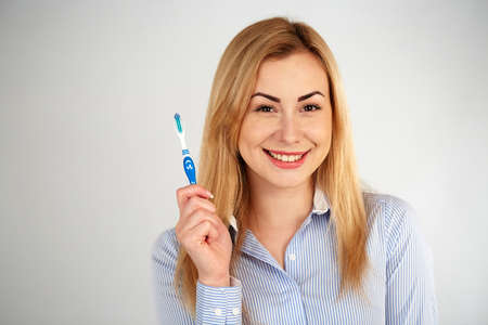 Healthy girl in diferent emotions, with dental flossの写真素材