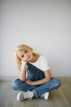 Teen beautiful girl in jeans clothes in diferent emotionの写真素材