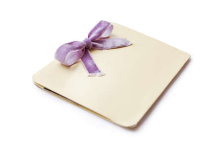 vintage card with lilac bow isolated on white background の写真素材