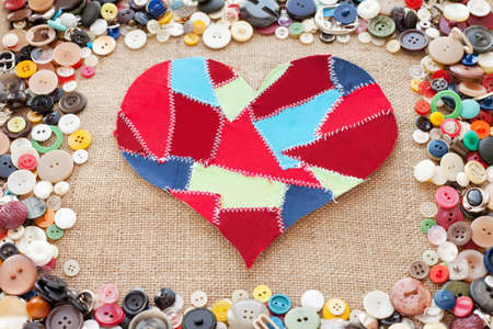 fabric scraps heart on texture background. Valentineの写真素材