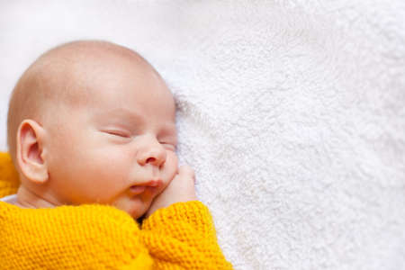 dreaming newborn baby boyの写真素材