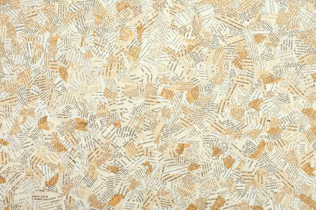 stuck together pieces of paper with text. Designed background.の写真素材