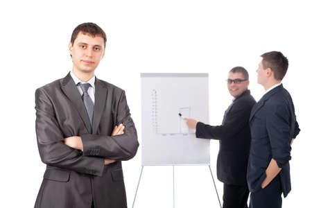 Group of businesspeople and a flipchart isolated on white backgroundの写真素材