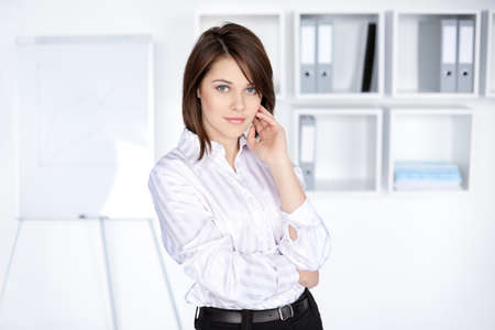 portrait of beautiful young business woman at officeの写真素材
