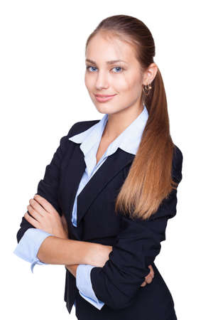 Portrait of young smiling businesswoman standing with hands folded against isolated on white backgroundの写真素材