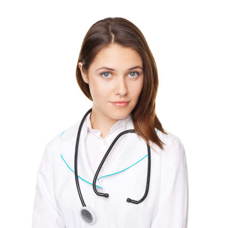 Portrait of young female doctor with arms crossed isolated on white backgroundの写真素材