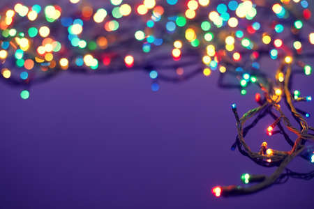 Christmas lights on dark blue background with copy space  Decorative garlandの写真素材