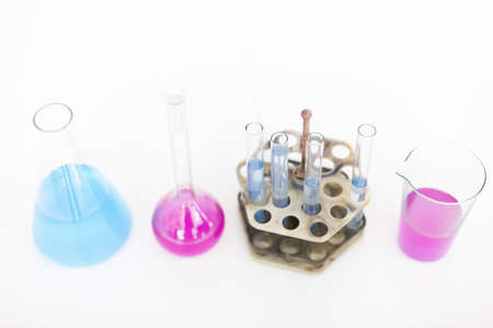 Chemical flasks with reagents on the tableの写真素材