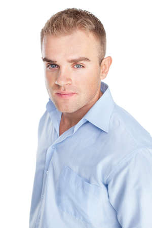 Closeup portrait of young serious businessman on white backgroundの写真素材