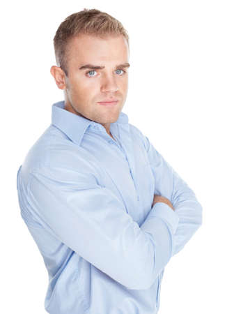 Closeup portrait of young serious businessman on white backgroundの写真素材
