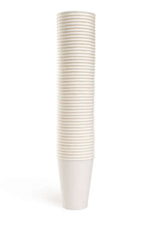 Stacks of white disposable paper cups isolated on white backgroundの写真素材