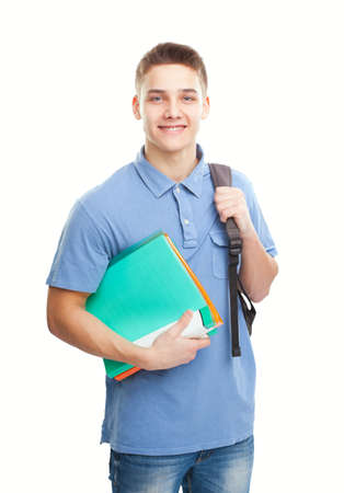 Portrait of happy smiling student with his notebook and backpack isolated on white backgroundの写真素材