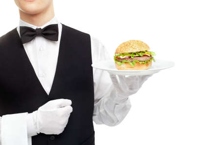 Waiter torso with hamburger on plate isolated on white backgroundの写真素材