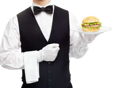 Waiter torso with hamburger on plate isolated on white backgroundの写真素材