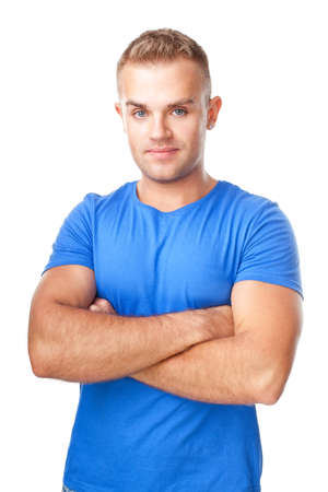 Portrait of happy smiling man standing with hands folded against isolated on white backgroundの写真素材