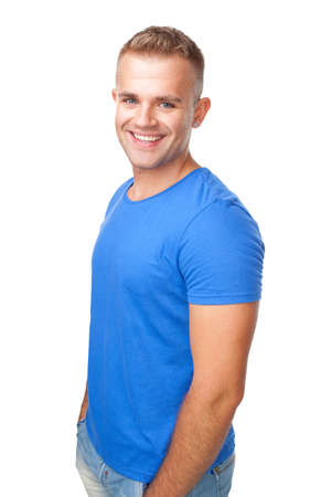 Portrait of happy smiling man standing isolated on white backgroundの写真素材