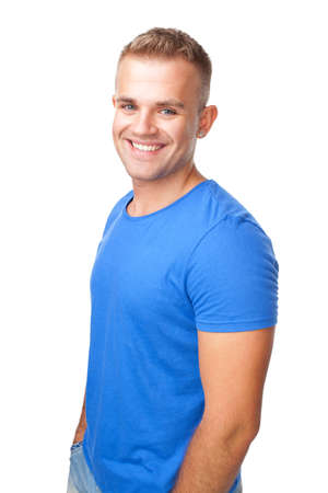 Portrait of happy smiling man standing isolated on white backgroundの写真素材