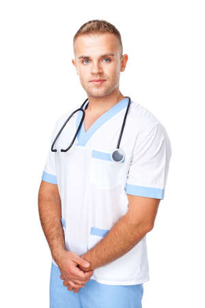 Portrait of friendly young doctor in uniform isolated on white backgroundの写真素材