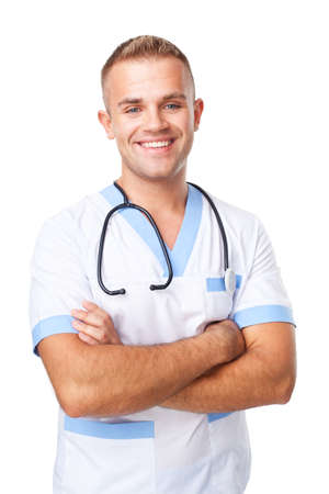 Portrait of happy smiling young doctor in uniform isolated on white backgroundの写真素材