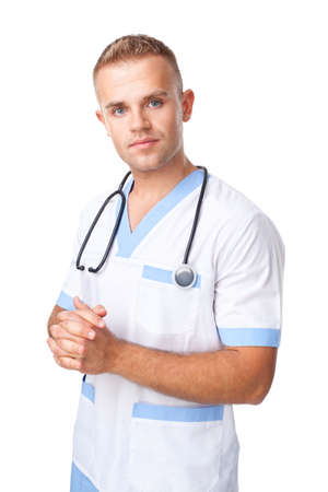 Portrait of happy smiling young doctor in uniform isolated on white backgroundの写真素材